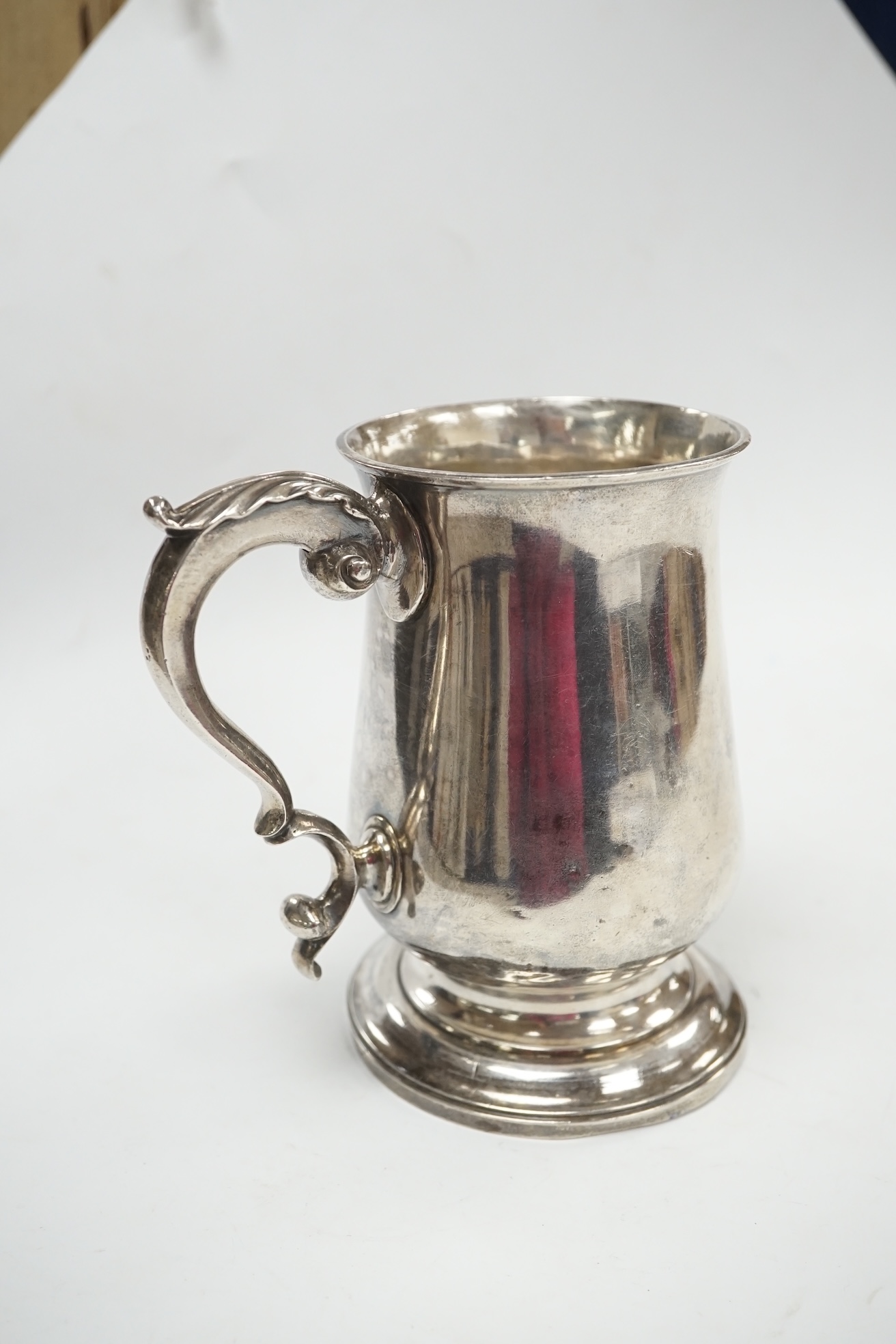 A George III silver baluster mug, William Turton, London, 1779, 12.5cm, 10.8oz. Condition - fair